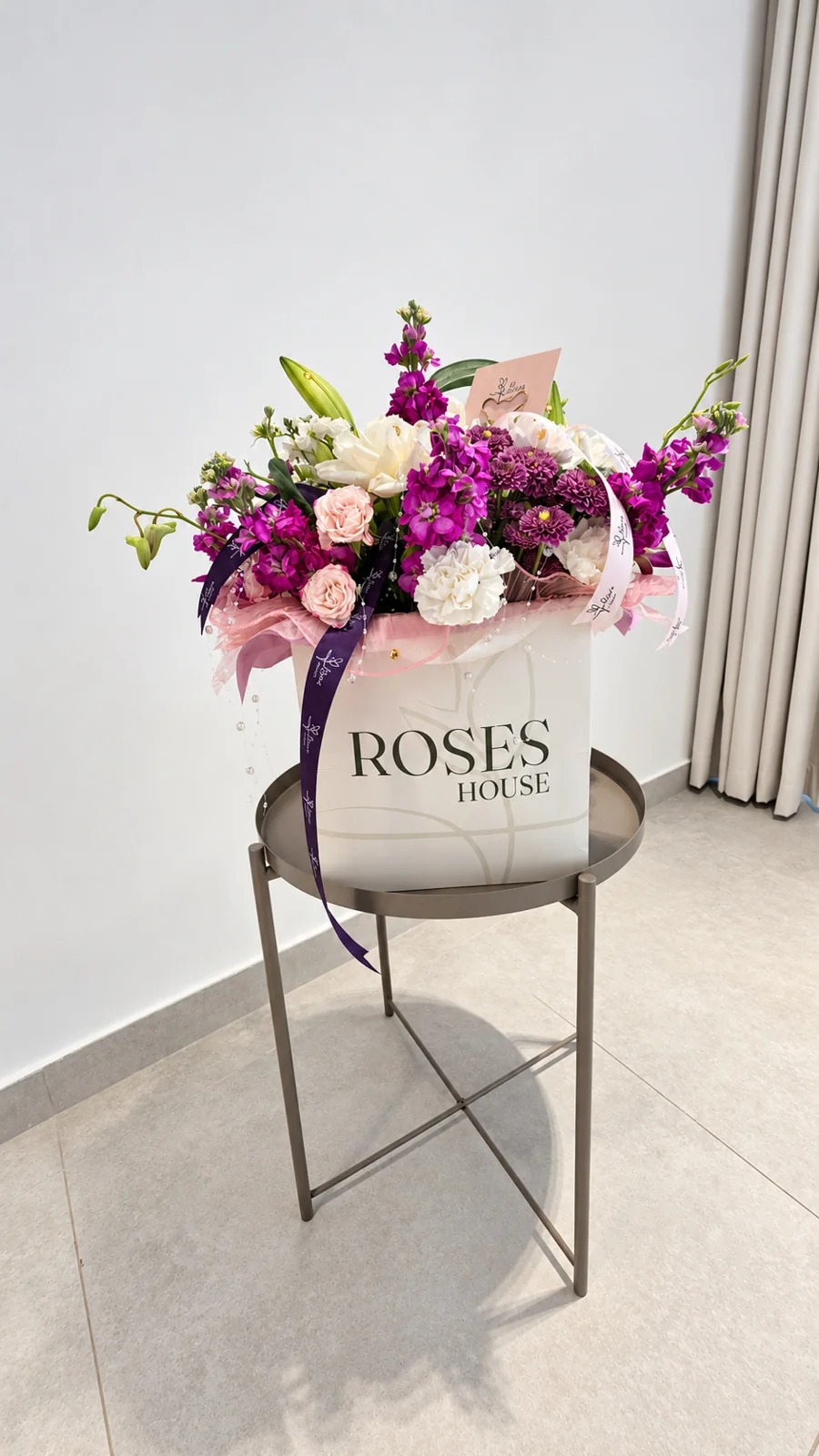 Roses House — Flowers in a signature bag